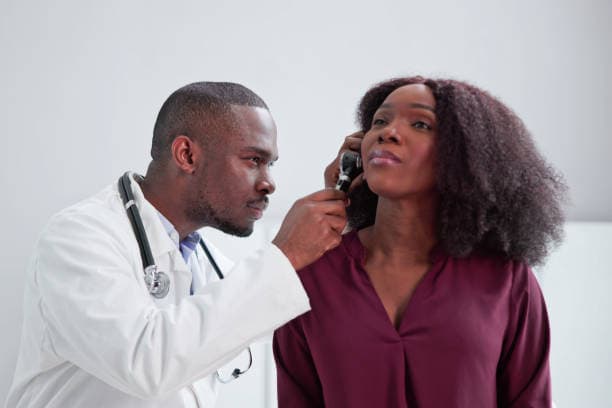 A healthcare professional taking time to discuss a patient's care